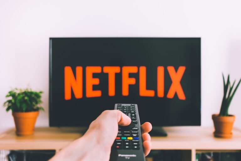 Person streaming US television on a tablet while living overseas