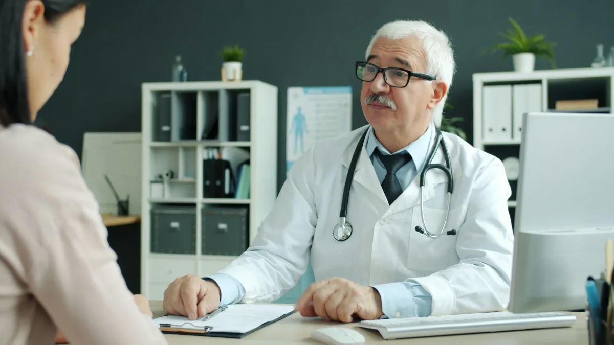 Doctor consulting with a patient